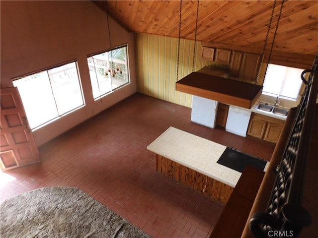 17216 Cedar Way, Clearlake Oaks, CA 95423 - unfurnished dining area with brick flooring, wooden ceiling, plenty of natural light, and vaulted ceiling