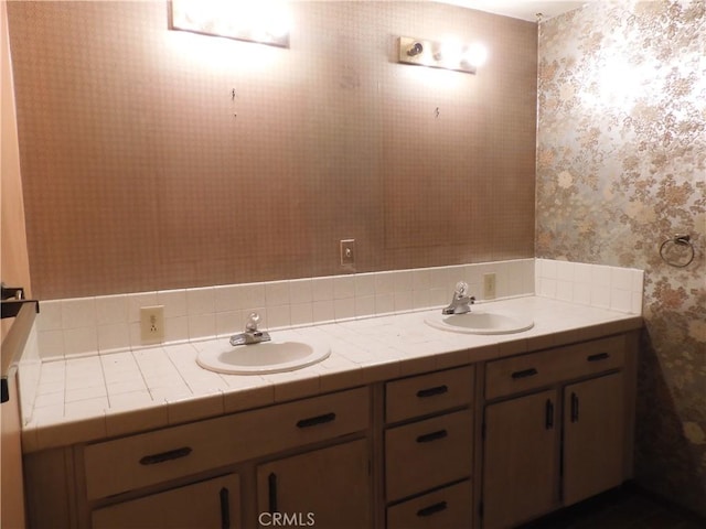 17216 Cedar Way, Clearlake Oaks, CA 95423 - bathroom featuring wallpapered walls and double vanity