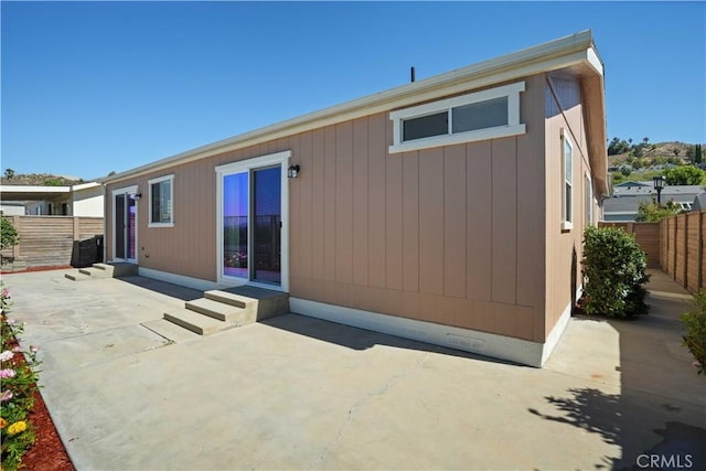 20128 Shadow Island Dr, Canyon Country, CA 91351 - rear view of house featuring a patio