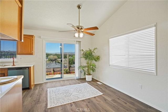 20128 Shadow Island Dr, Canyon Country, CA 91351 - dining area featuring ceiling fan, light wood-style flooring, and vaulted ceiling