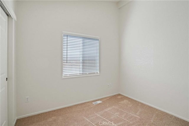 20128 Shadow Island Dr, Canyon Country, CA 91351 - spare room featuring light carpet and healthy amount of natural light