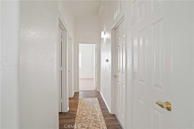 20128 Shadow Island Dr, Canyon Country, CA 91351 - hall with dark wood-type flooring and a textured wall