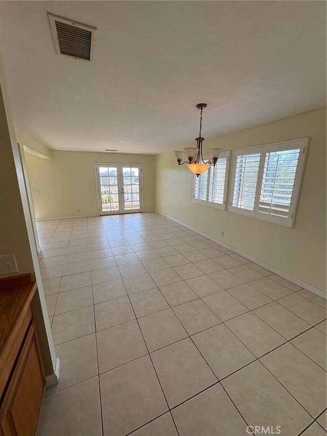429 S Hill St, Orange, CA 92869 - empty room featuring light tile patterned flooring and french doors