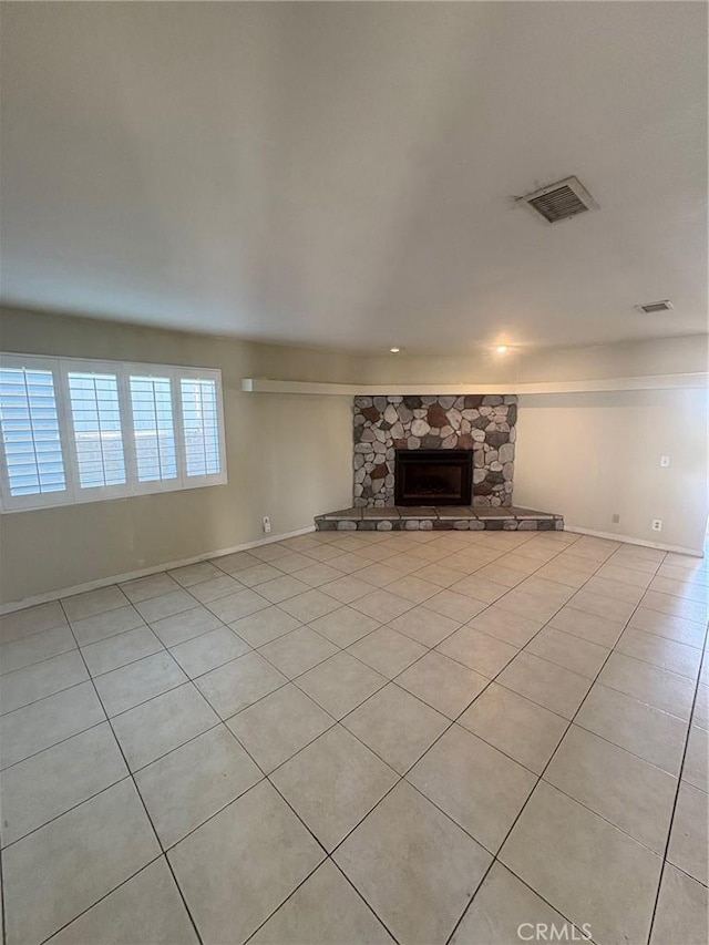 429 S Hill St, Orange, CA 92869 - unfurnished living room with light tile patterned flooring and a fireplace