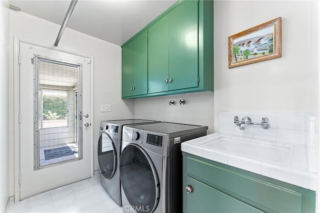 2117 N Westwood Ave, Santa Ana, CA 92706 - washroom featuring cabinet space and independent washer and dryer