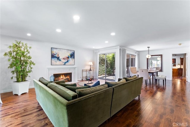 2117 N Westwood Ave, Santa Ana, CA 92706 - living area featuring dark wood-type flooring, recessed lighting, and a fireplace