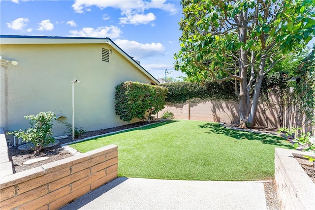2117 N Westwood Ave, Santa Ana, CA 92706 - fenced backyard with a patio