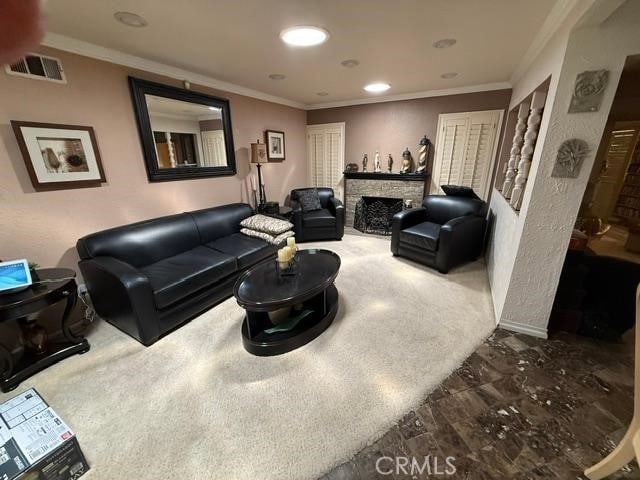 830 W Heber St, Glendora, CA 91741 - living room featuring a fireplace, crown molding, and recessed lighting