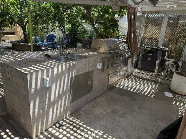 830 W Heber St, Glendora, CA 91741 - view of patio with an outdoor kitchen and a sink