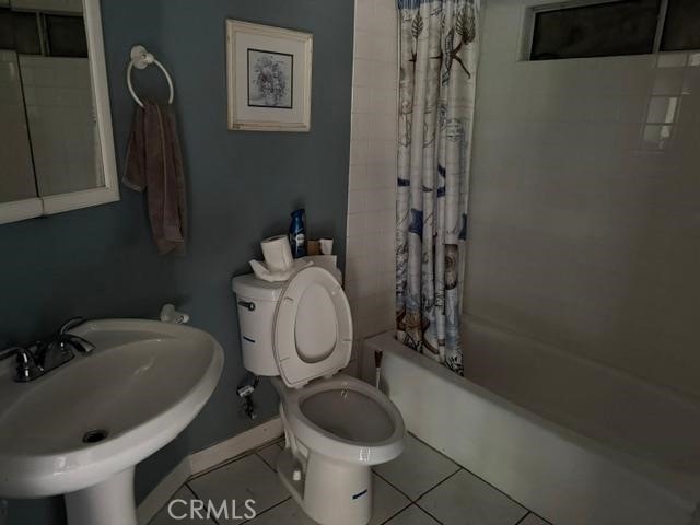 830 W Heber St, Glendora, CA 91741 - bathroom featuring shower / bathtub combination with curtain and tile patterned flooring