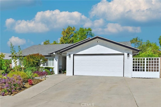 10601 Eton Ave, Chatsworth, CA 91311 - ranch-style house with an attached garage and concrete driveway