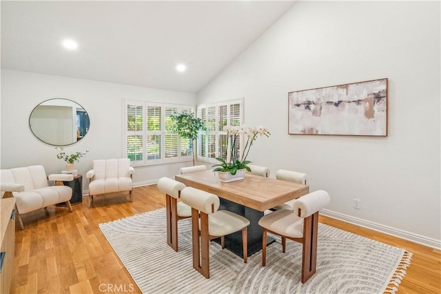 10601 Eton Ave, Chatsworth, CA 91311 - dining space with light wood finished floors, recessed lighting, and high vaulted ceiling