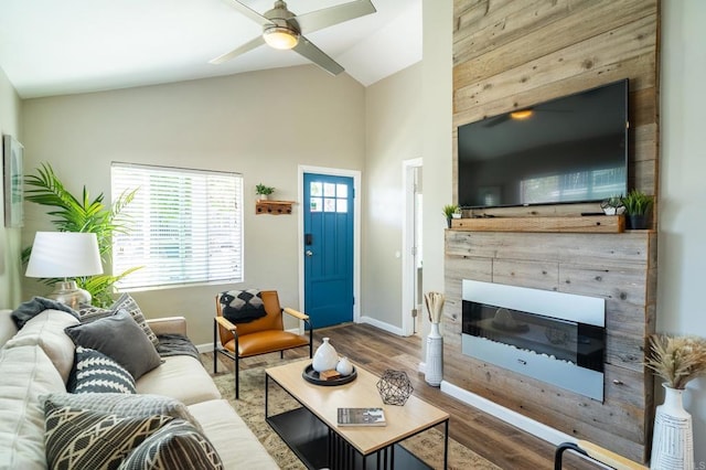 3721 Chamoune Ave, San Diego, CA 92105 - living area featuring a fireplace, high vaulted ceiling, wood finished floors, and a ceiling fan