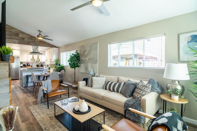 3721 Chamoune Ave, San Diego, CA 92105 - living area with ceiling fan, vaulted ceiling, and wood finished floors