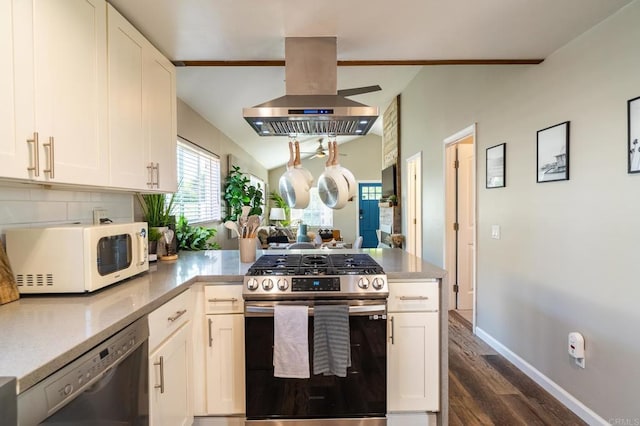 3721 Chamoune Ave, San Diego, CA 92105 - kitchen with gas range, white microwave, island range hood, dishwasher, and a peninsula