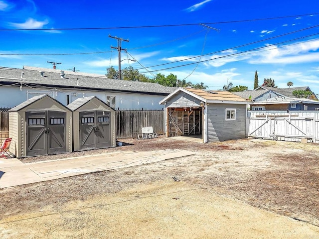 3721 Chamoune Ave, San Diego, CA 92105 - view of shed featuring a fenced backyard and a gate