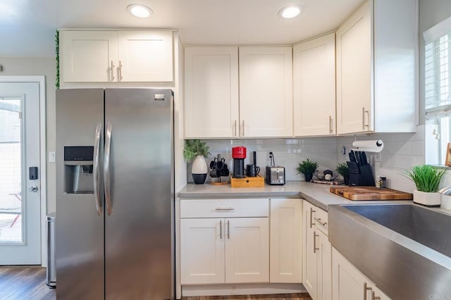 3721 Chamoune Ave, San Diego, CA 92105 - kitchen featuring stainless steel fridge, white cabinets, light countertops, and recessed lighting