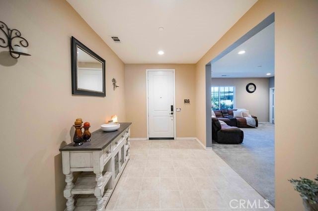 30106 Stargazer Way, Menifee, CA 92584 - entrance foyer with recessed lighting and light colored carpet