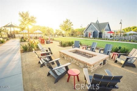 30106 Stargazer Way, Menifee, CA 92584 - view of patio with a fire pit