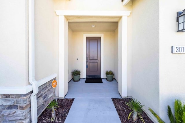 30106 Stargazer Way, Menifee, CA 92584 - view of exterior entry with stucco siding