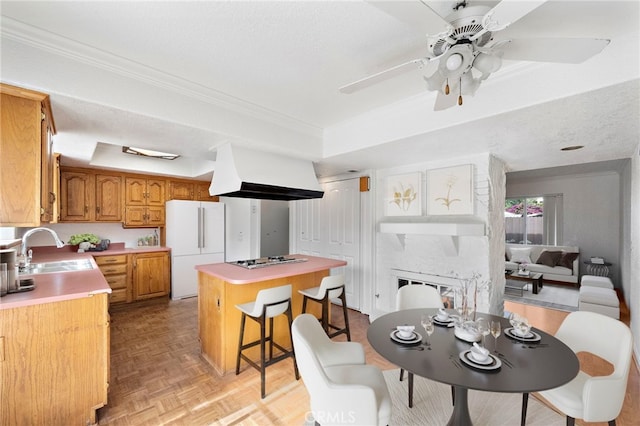 11903 Oertly Cir, Garden Grove, CA 92840 - dining space featuring a raised ceiling, ceiling fan, and ornamental molding