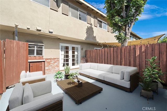 11903 Oertly Cir, Garden Grove, CA 92840 - view of patio / terrace featuring outdoor lounge area and french doors
