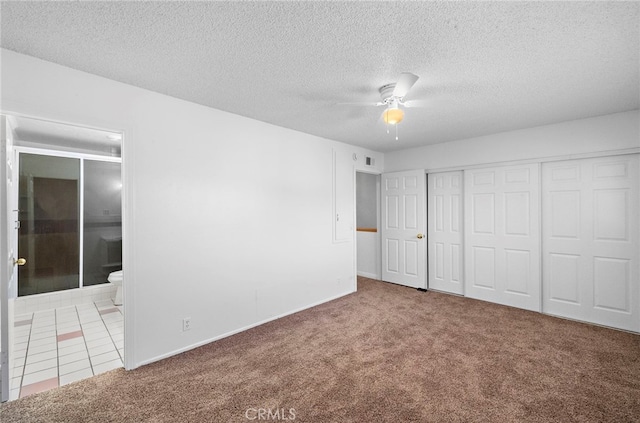 11903 Oertly Cir, Garden Grove, CA 92840 - unfurnished bedroom with carpet, connected bathroom, a closet, a textured ceiling, and ceiling fan