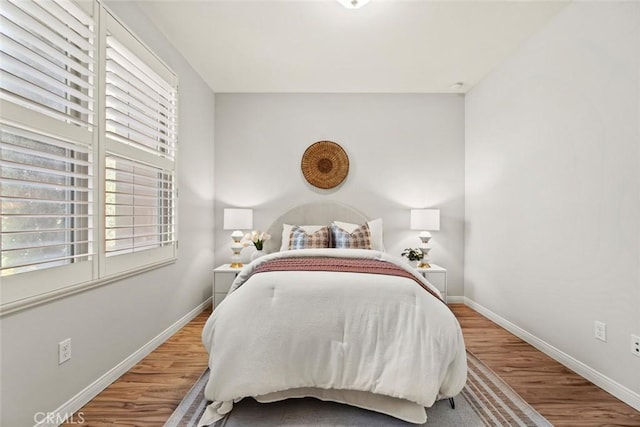 111 Thornhurst, Irvine, CA 92620 - bedroom featuring wood finished floors