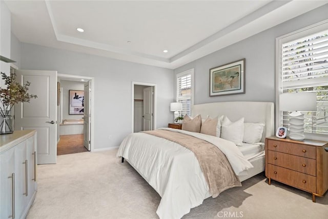 111 Thornhurst, Irvine, CA 92620 - bedroom featuring light colored carpet, a raised ceiling, recessed lighting, and ensuite bathroom
