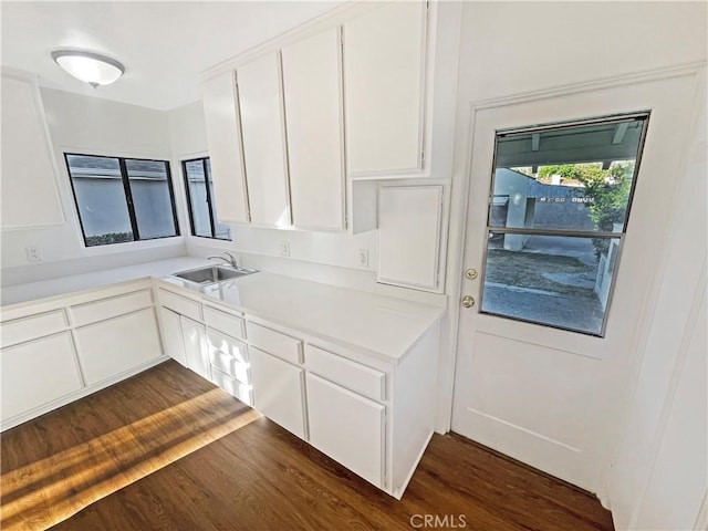 2334 N Keystone St, Burbank, CA 91504 - kitchen featuring dark wood finished floors, white cabinetry, and light countertops