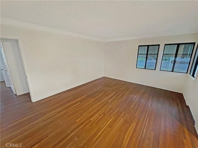 2334 N Keystone St, Burbank, CA 91504 - spare room with dark wood-style floors and a textured ceiling