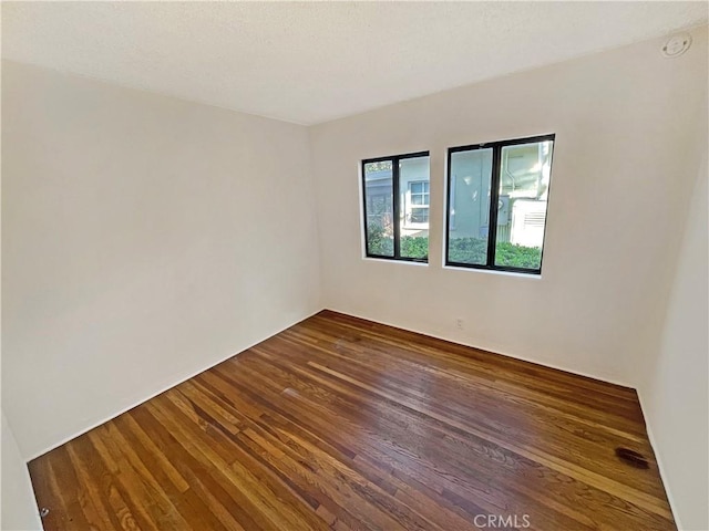 2334 N Keystone St, Burbank, CA 91504 - unfurnished room with wood finished floors and a smoke detector