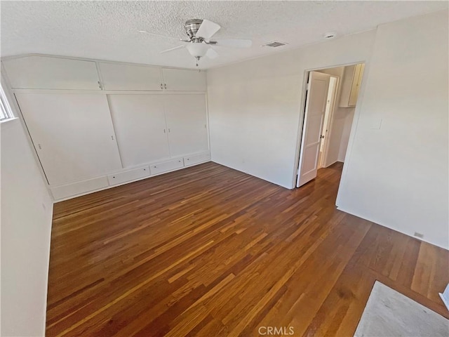 2334 N Keystone St, Burbank, CA 91504 - unfurnished bedroom with wood finished floors, a textured ceiling, ceiling fan, and a closet