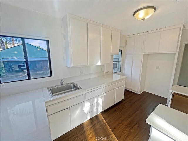 2334 N Keystone St, Burbank, CA 91504 - kitchen featuring white cabinets, dark wood finished floors, and light countertops