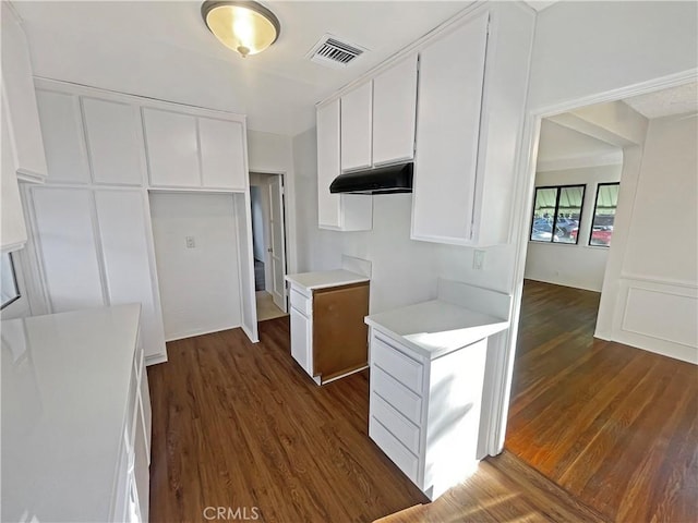 2334 N Keystone St, Burbank, CA 91504 - kitchen featuring dark wood-type flooring, white cabinetry, and light countertops
