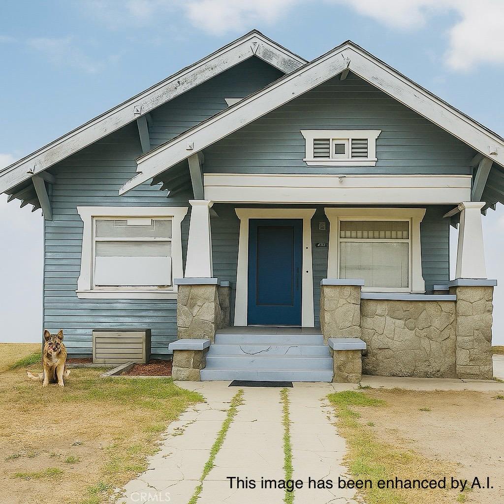 3645 2nd Ave, Los Angeles, CA 90018 - view of front facade with covered porch and stone siding