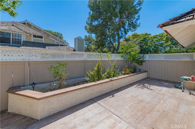 23 Thunder Trl Unit 12, Irvine, CA 92614 - fenced backyard featuring a patio