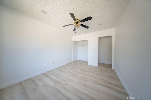 16520 Adelia St, Hesperia, CA 92345 - unfurnished bedroom featuring a textured ceiling, light wood finished floors, a closet, and a ceiling fan