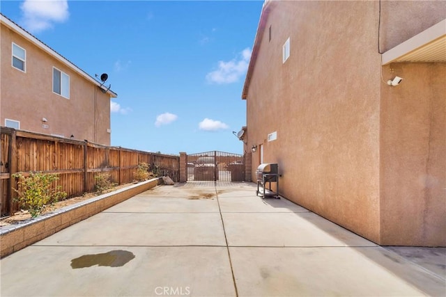 13695 Mesa Linda Ave, Victorville, CA 92392 - view of patio featuring a gate and a grill
