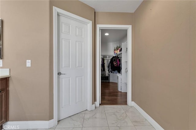 13695 Mesa Linda Ave, Victorville, CA 92392 - hallway featuring light marble finish flooring and baseboards