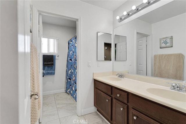 13695 Mesa Linda Ave, Victorville, CA 92392 - full bathroom featuring marble look tile flooring and double vanity