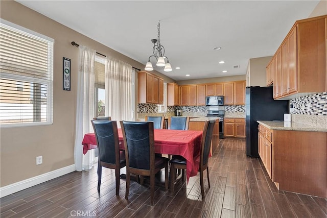 13695 Mesa Linda Ave, Victorville, CA 92392 - dining area with dark wood-type flooring, recessed lighting, and a chandelier