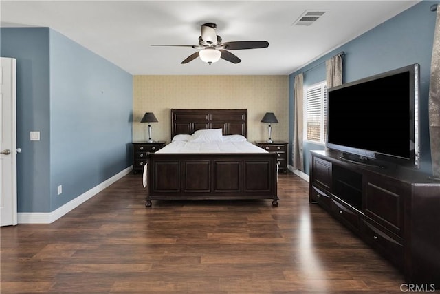 13695 Mesa Linda Ave, Victorville, CA 92392 - bedroom featuring an accent wall, wallpapered walls, dark wood finished floors, and ceiling fan