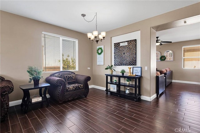 13695 Mesa Linda Ave, Victorville, CA 92392 - sitting room featuring dark wood-style flooring, a chandelier, and a ceiling fan