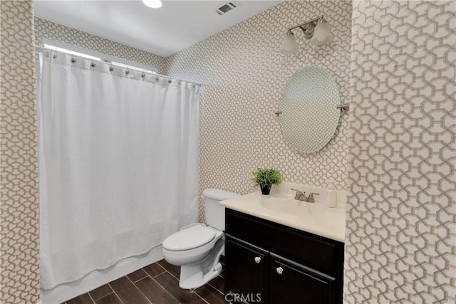 13695 Mesa Linda Ave, Victorville, CA 92392 - full bath with wallpapered walls, vanity, wood finished floors, and shower / bath combination with curtain