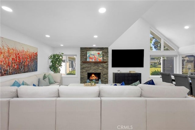 5042 Olympic Dr, Los Alamitos, CA 90720 - living room featuring a fireplace, recessed lighting, and vaulted ceiling