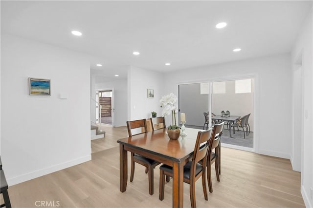 5042 Olympic Dr, Los Alamitos, CA 90720 - dining room featuring light wood-style floors, stairway, and recessed lighting