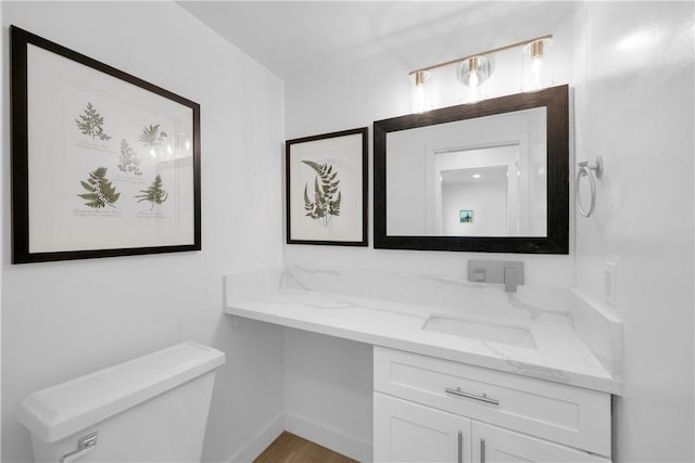 5042 Olympic Dr, Los Alamitos, CA 90720 - half bathroom with toilet and vanity
