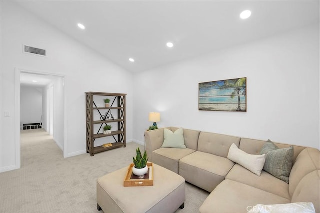 5042 Olympic Dr, Los Alamitos, CA 90720 - living room featuring light colored carpet, lofted ceiling, and recessed lighting
