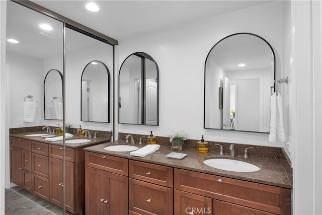 5042 Olympic Dr, Los Alamitos, CA 90720 - full bath featuring double vanity and recessed lighting